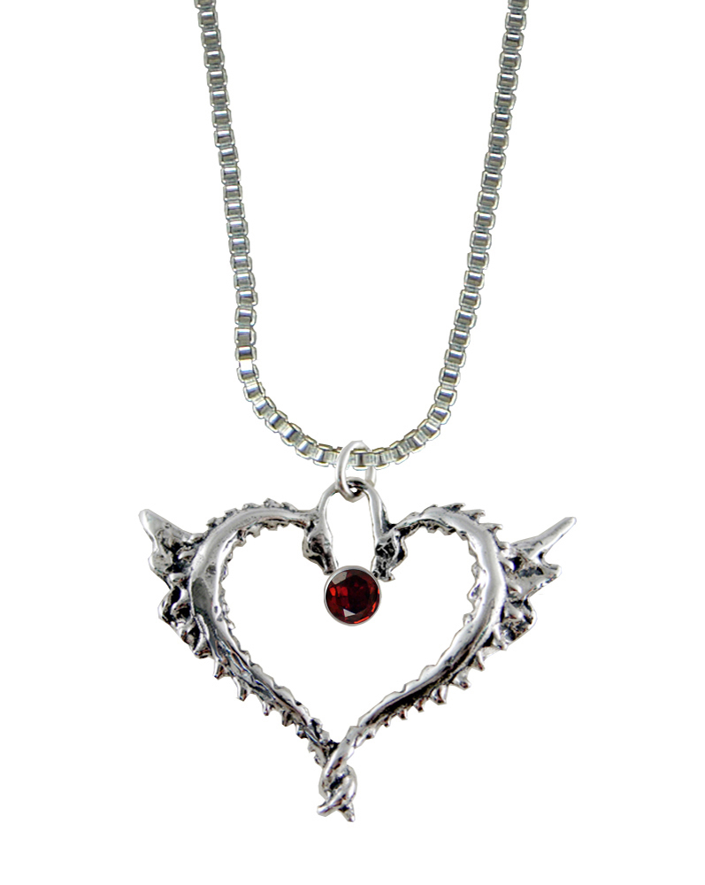 Sterling Silver Dragon Heart Pendant With Faceted Garnet